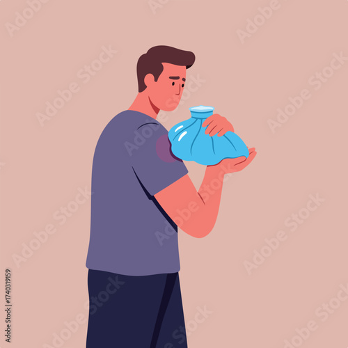 Person applies a cold pack to a sore shoulder