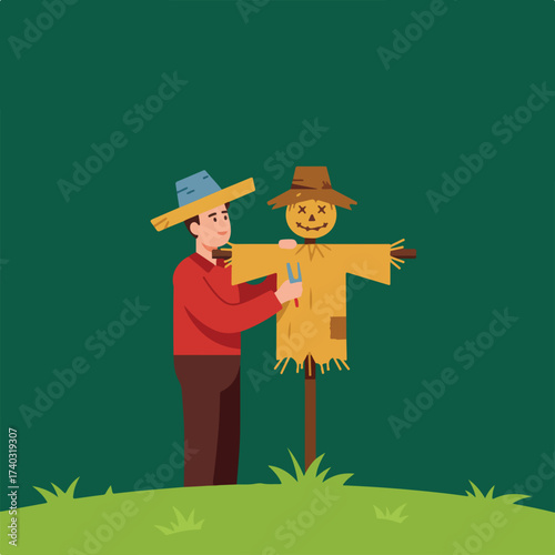 Person building a scarecrow in a field