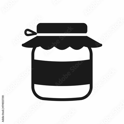 A black and white illustration of a jar with a lid and a label.