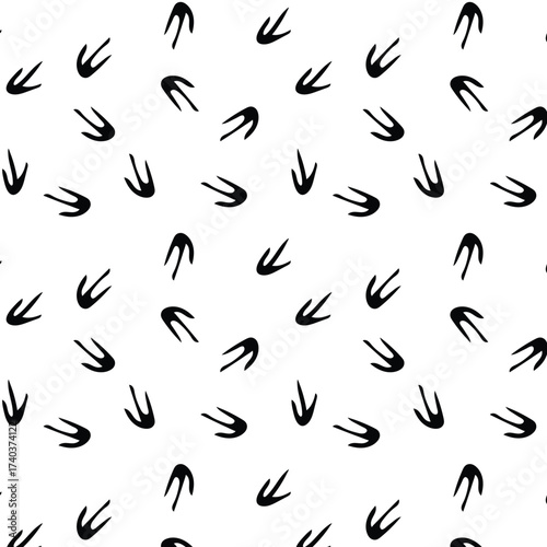 Seamless pattern with black penguin footprint on transparent background