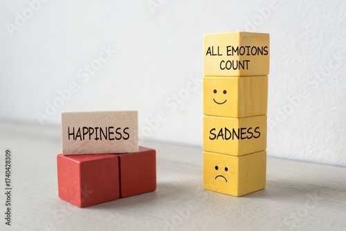 Toy blocks arranged to show emotions and happiness