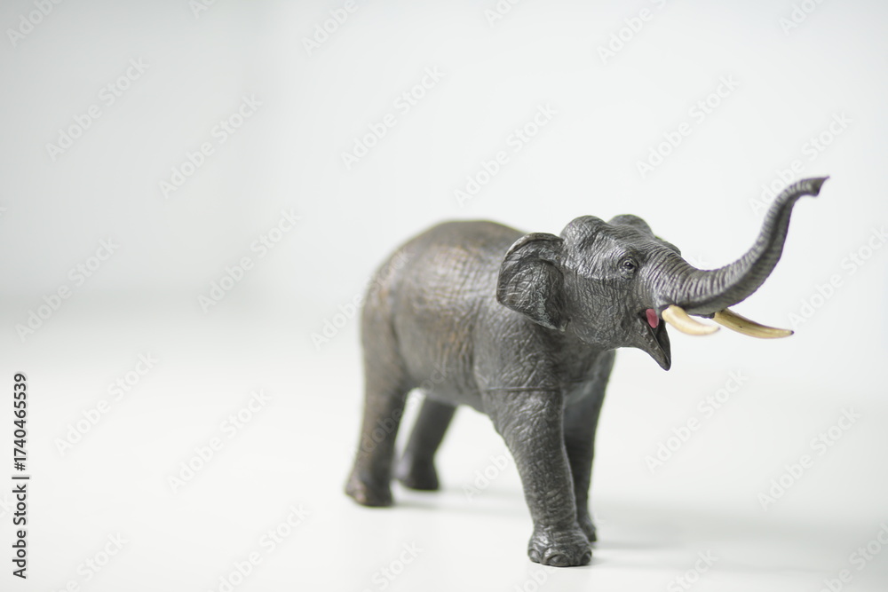 Fototapeta premium Close-up studio shot of an elephant figurine showcasing its intricate details