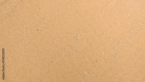 Abstract brown recycled paper background. Old Kraft paper texture box craft stripes pattern. top view.

