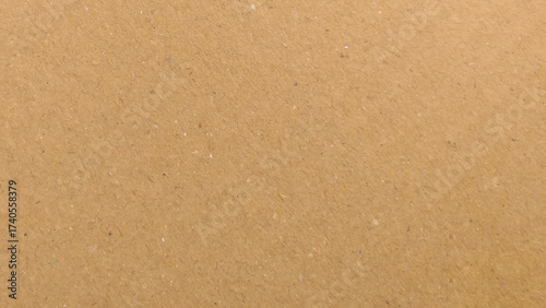 Abstract brown recycled paper background. Old Kraft paper texture box craft stripes pattern. top view.
