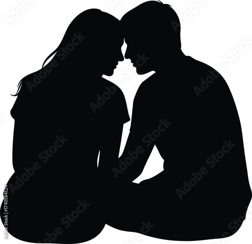 Romantic couple in love silhouette, man and woman sitting together in an intimate moment