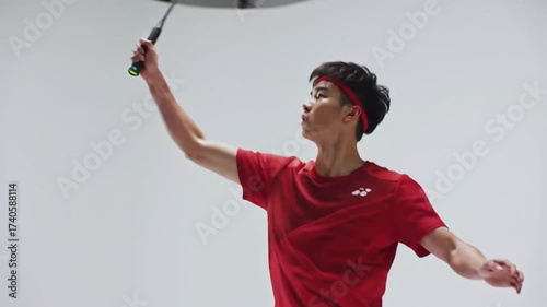 Badminton player with focused gaze