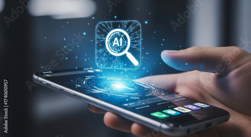 Hand holding smartphone with AI search icon hovering above screen, representing artificial intelligence technology.