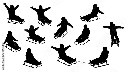 Children's silhouettes on sledging
