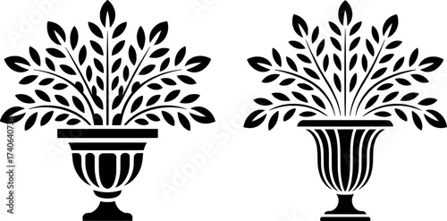 Two black and white silhouette urns filled with stylized leafy branches