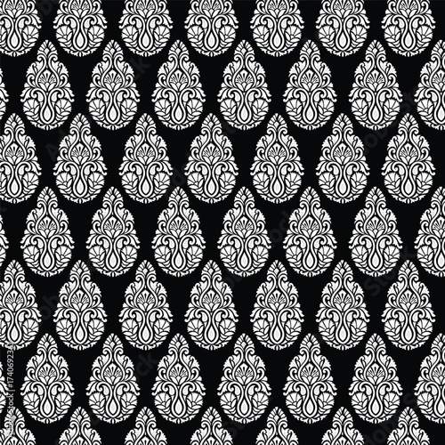 Intricate black and white paisley seamless pattern with detailed ornamental motifs. Perfect for wallpapers, textiles, fashion prints, and decorative projects with timeless artistic appeal