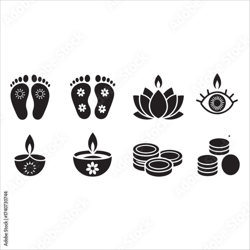 This image displays a collection of eight black and white icons arranged in two rows. The icons represent various symbols commonly associated with Diwali, including Lakshmi's footprints, lotus flowers