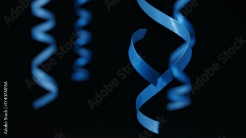 Elegant Blue Ribbon Twists and Swirls in Dark Space
