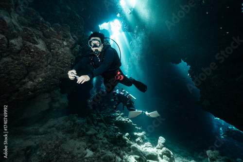 Wallpaper Mural diver exploring St Johns cave system in the Red Sea Torontodigital.ca