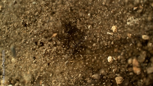 Freeze Motion Shot of Soil ...