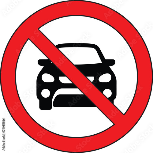 The sign features a black silhouette of a car overlaid with a thick, red diagonal line within a red circular border. This universal traffic symbol signifies a No Entry for Cars or Vehicle Restriction 