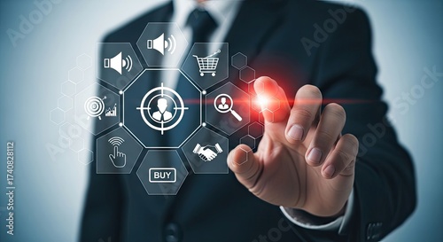 Asian Businessman touches Virtual Screen with Shopping and Target Icons Displaying