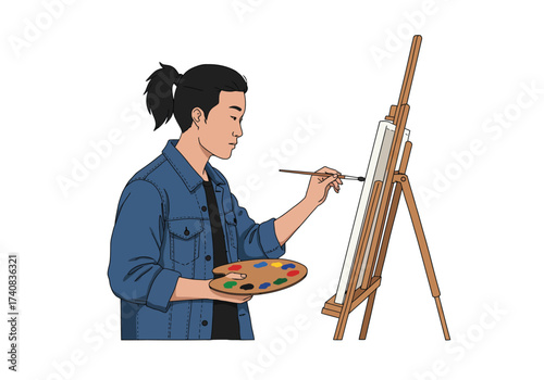 Artist painting on a canvas held by an easel wearing a denim jacket  holding a paint palette