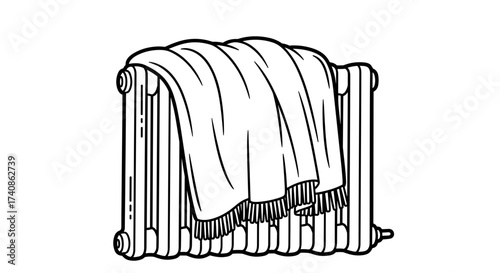Warm blanket draped over radiator, cozy home heating solution