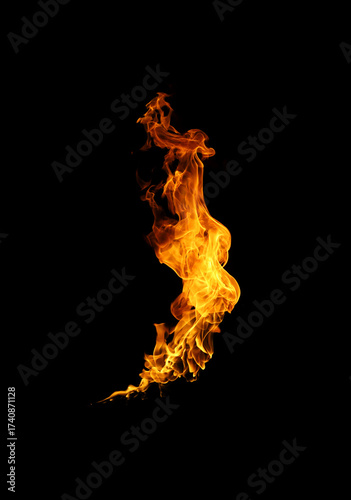Fotografie Realistic vertical fire flame isolated on black background