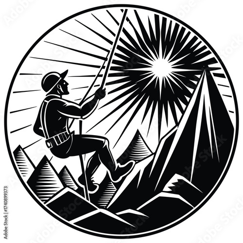Adventurous man rappelling down a mountain peak during a bright sunny day silhouette