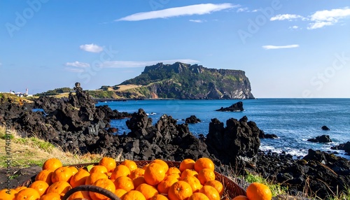 Scenic coastal landscape with a basket of oranges and a mountain in the background