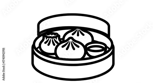 Steaming hot dumplings in a bamboo steamer ready to eat delicious food.
