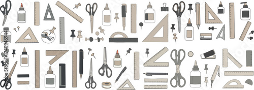 A collection of stationery and crafting tools including scissors, rulers, and glue bottles.