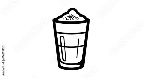 Delicious beverage with foam and sprinkles in a tall glass refreshing drink.