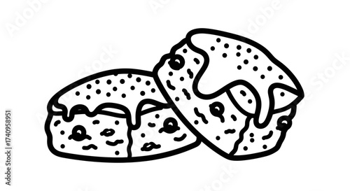 Two delicious looking baked goods with dots and icing on top tasty dessert.