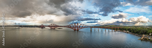 Panorama of Rain clouds over Forth Bridge from a drone, Queensferry Crossing, Forth Estuary, Scotland