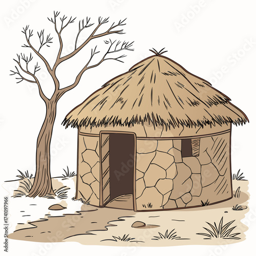 Traditional mud hut with thatched roof and bare tree