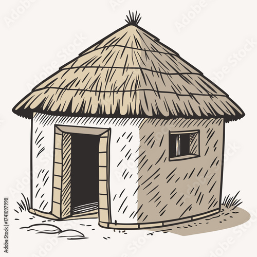 Traditional mud hut with thatched roof and straw grass