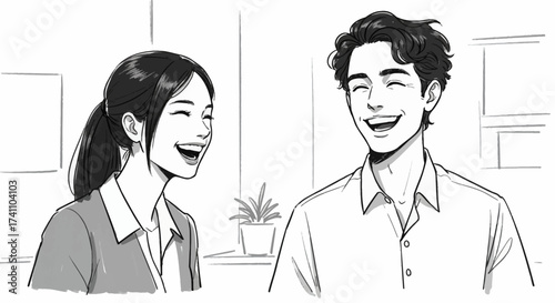 Cheerful colleagues laughing together in a work environment