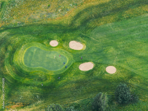 Aerial View of a Golf Course with Sand Traps