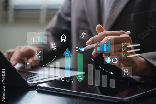 Cost optimization strategy with business analyst using tablet and laptop to improve quality and reduce expenses. highlighting data analysis, planning, and performance in corporate environment