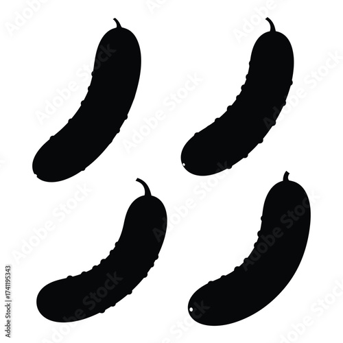 Four silhouetted cucumbers arranged creatively for food and salad ingredient graphics silhouette