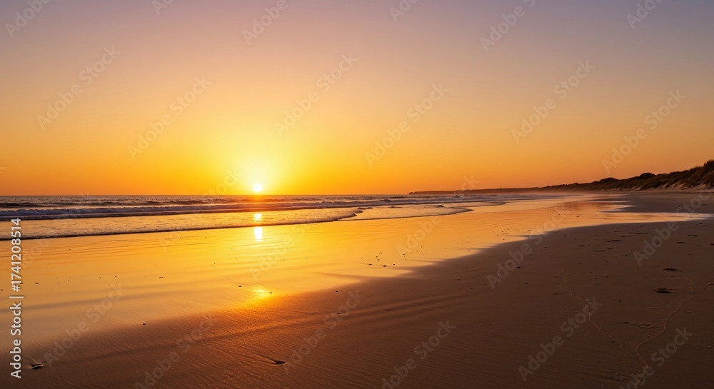 Obraz premium Beach Sunset with Waves and Sand