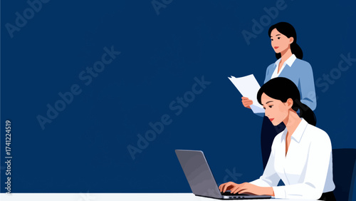 Two women working with laptop and documents