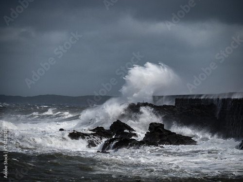 crashing waves over Holyhead breakwater isle of Anglesey