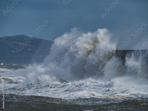 crashing waves over Holyhead breakwater isle of Anglesey