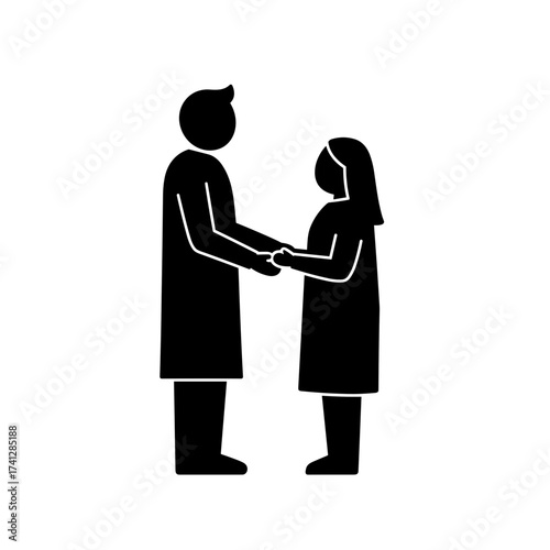 Doctor and patient shaking hands in a trusting relationship for International Doctor's Day  