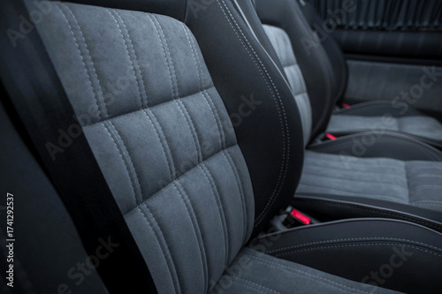 Comfortable interior of a passenger bus with soft seats