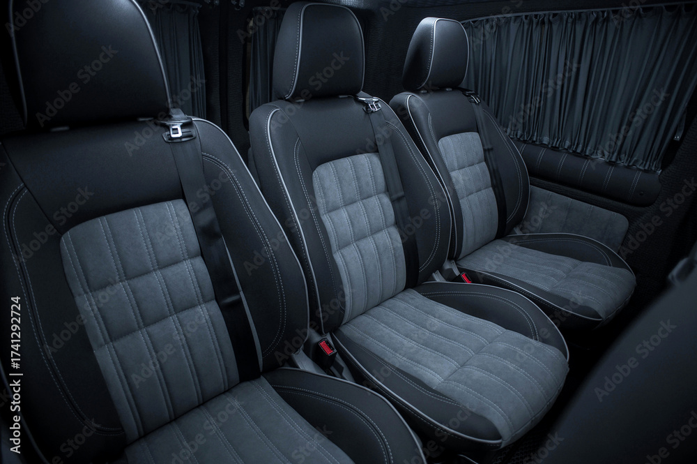 Fototapeta premium Comfortable interior of a passenger bus with soft seats