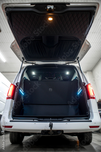 Comfortable interior of a passenger bus with soft seats