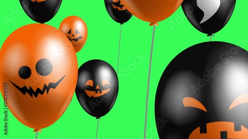 halloween   balloons with scary faces on green screen  chroma key video footage
