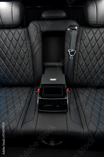 Comfortable interior of a passenger bus with soft seats