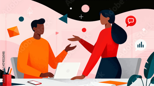 Two people collaborating at a desk with laptop