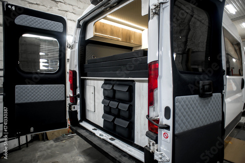 Comfortable interior of a passenger bus with soft seats