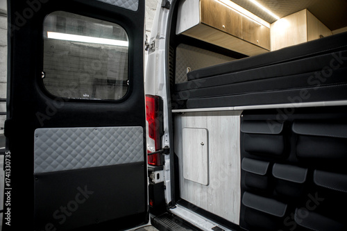 Comfortable interior of a passenger bus with soft seats