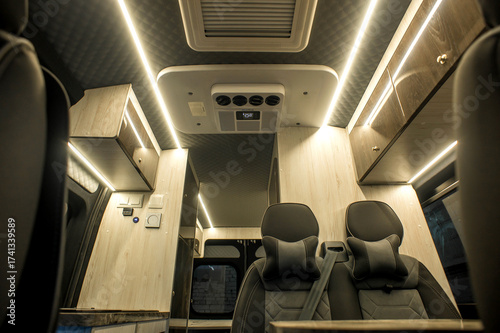 Comfortable interior of a passenger bus with soft seats